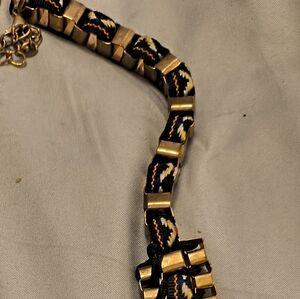 Black and Gold tone necklace.